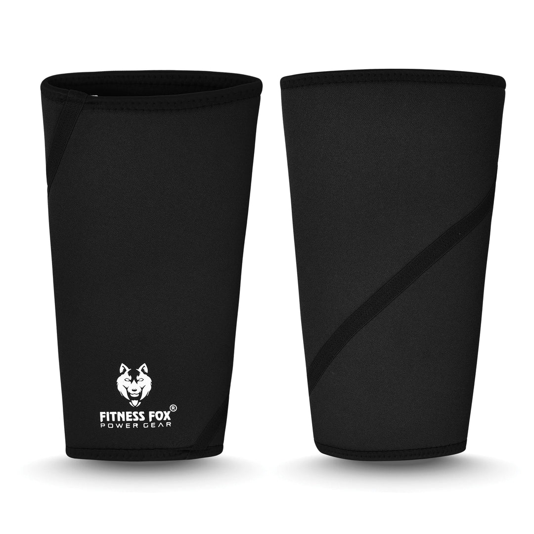 “Front view of Fitness Fox 7mm black knee sleeves showing reinforced stitching and supportive neoprene construction designed for steady squats and lunges.”