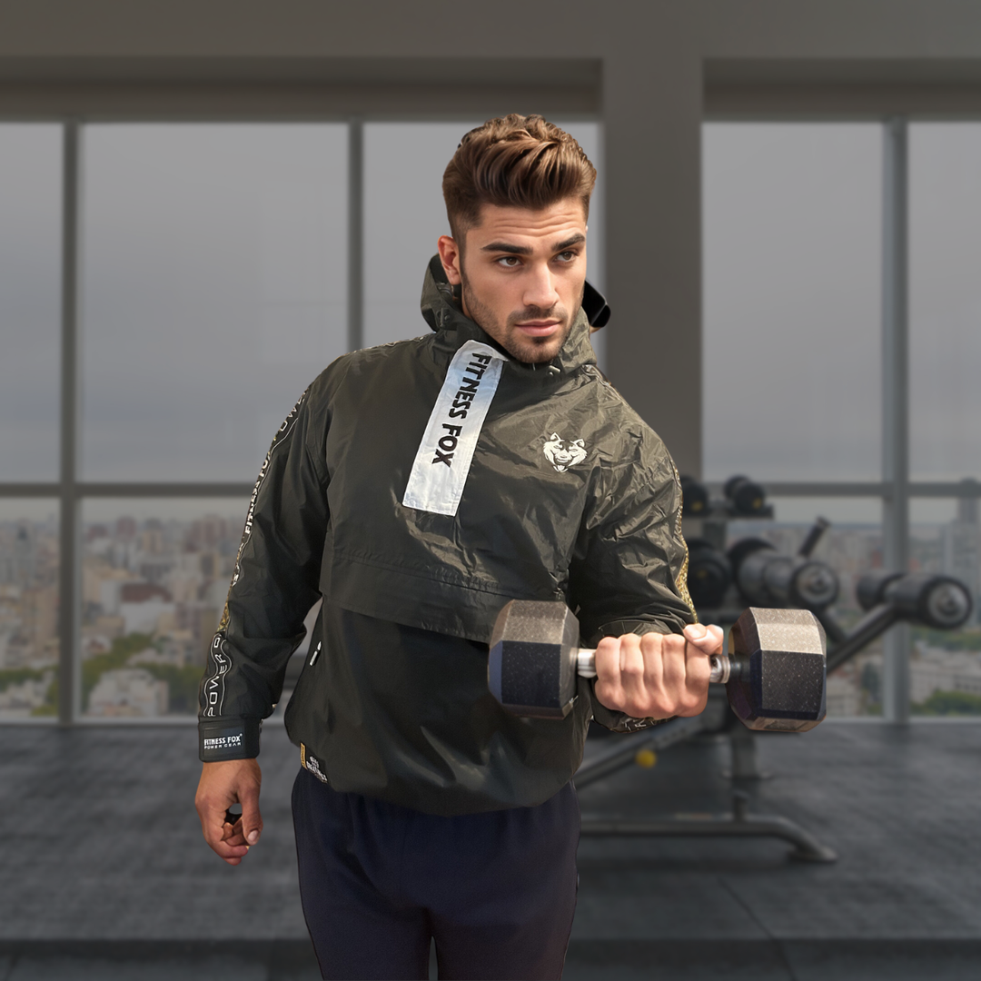 Front view of the Black/White Fitness Fox hooded sauna jacket, highlighting rubberised lining, clean branding, and an athletic unisex fit for heat-focused training sessions.
