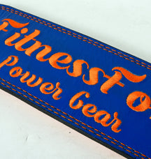 4-inch blue lifting belt by Fitness Fox showing thickness and firm core support