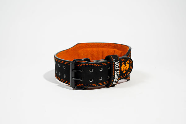 Flat lay — Fitness Fox 4-inch black leather weightlifting belt laid flat, sizes XS–4XL available