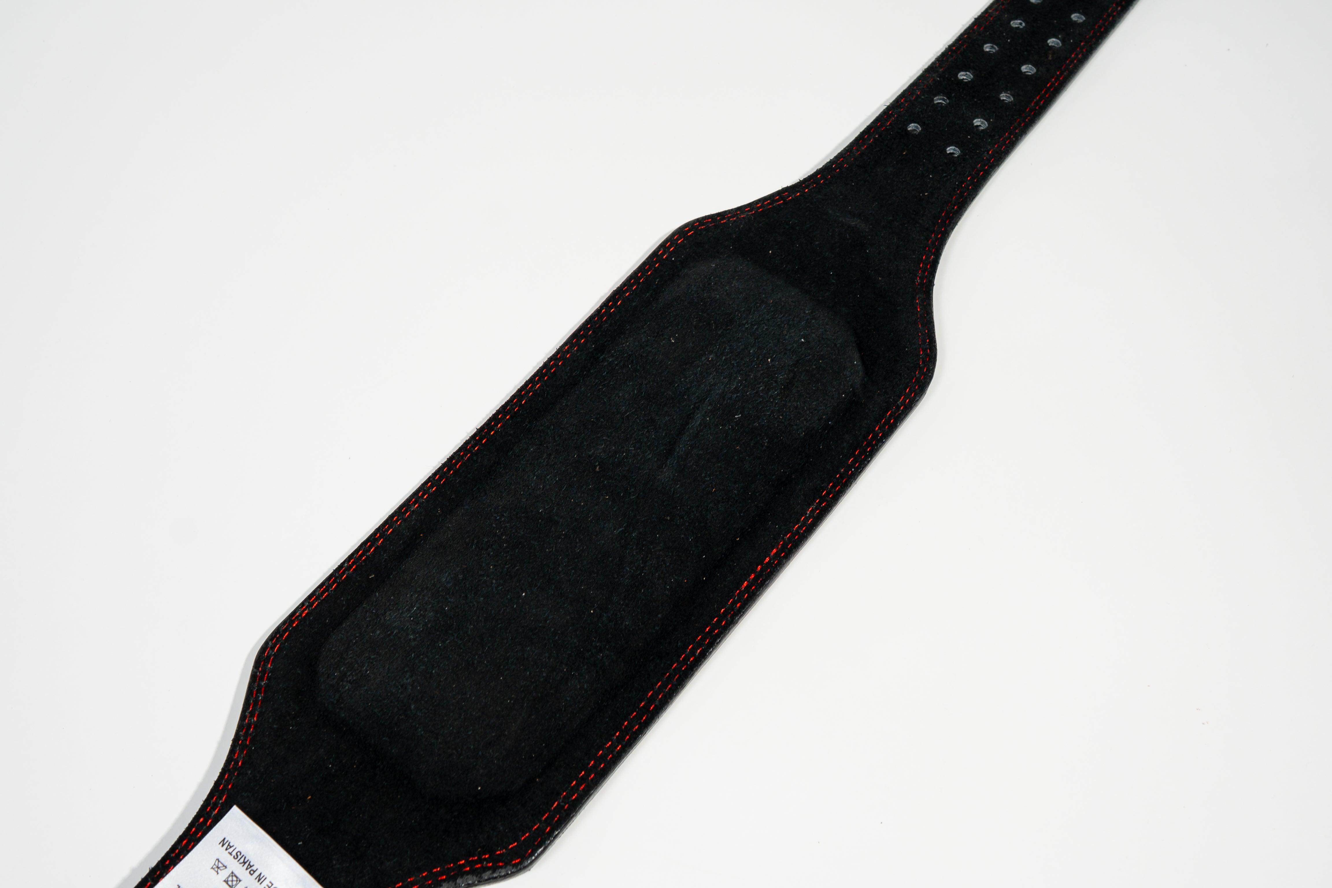 6-inch black suede lifting belt rolled for gym bag, compact storage