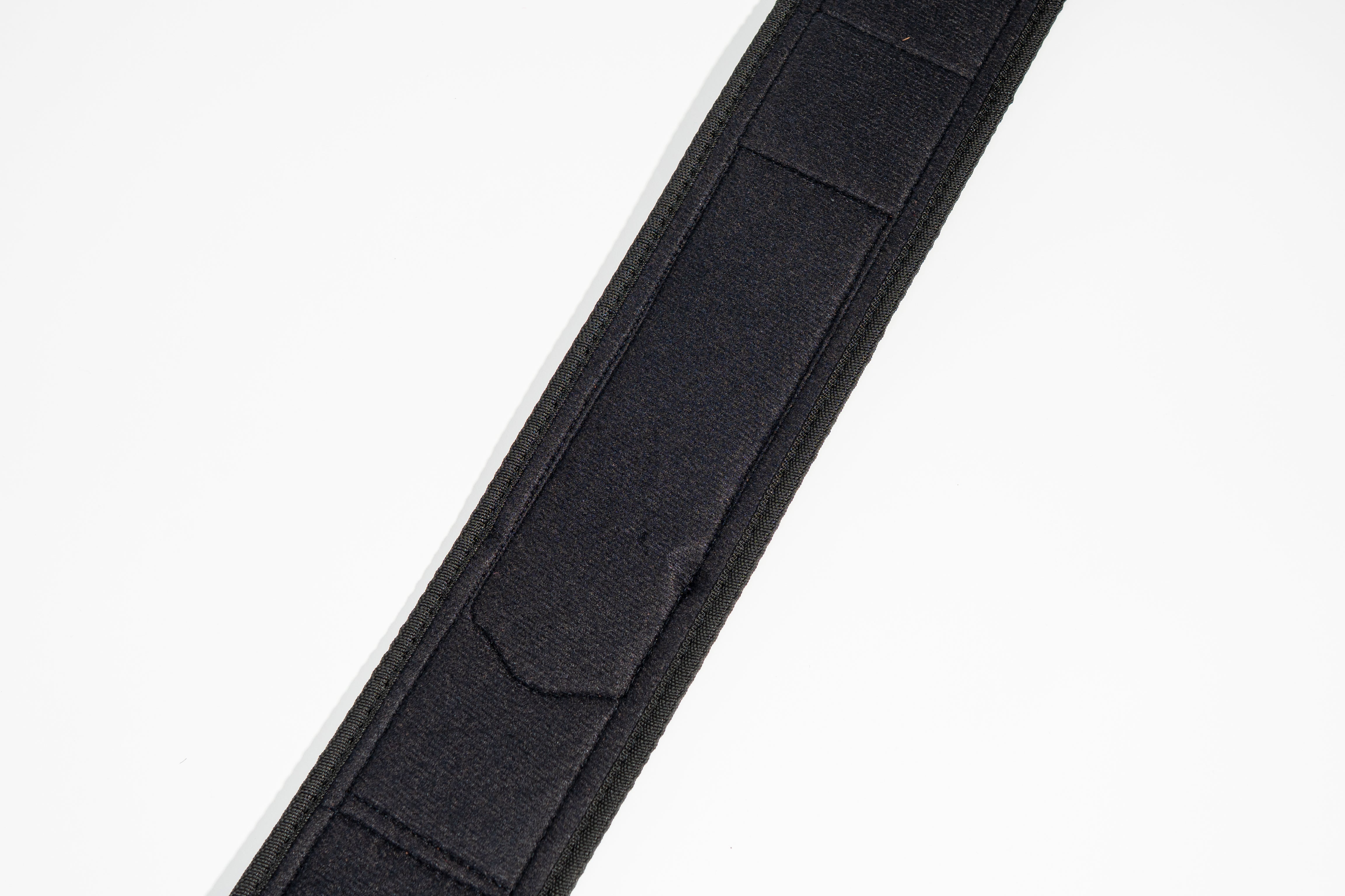 Back panel — lumbar support area of quick-locking weightlifting belt in Black