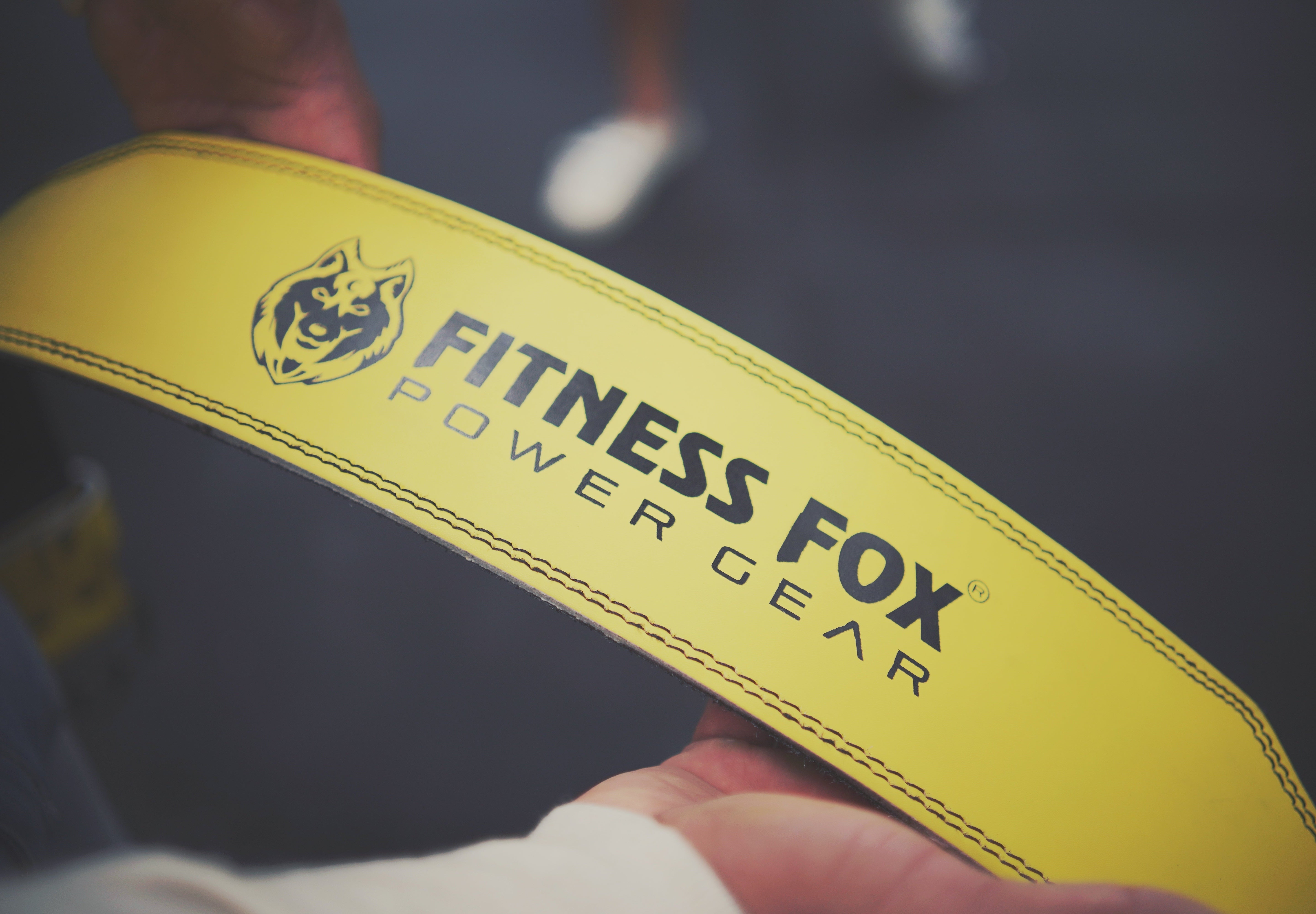 High-quality quick release weightlifting belt in yellow for strength training