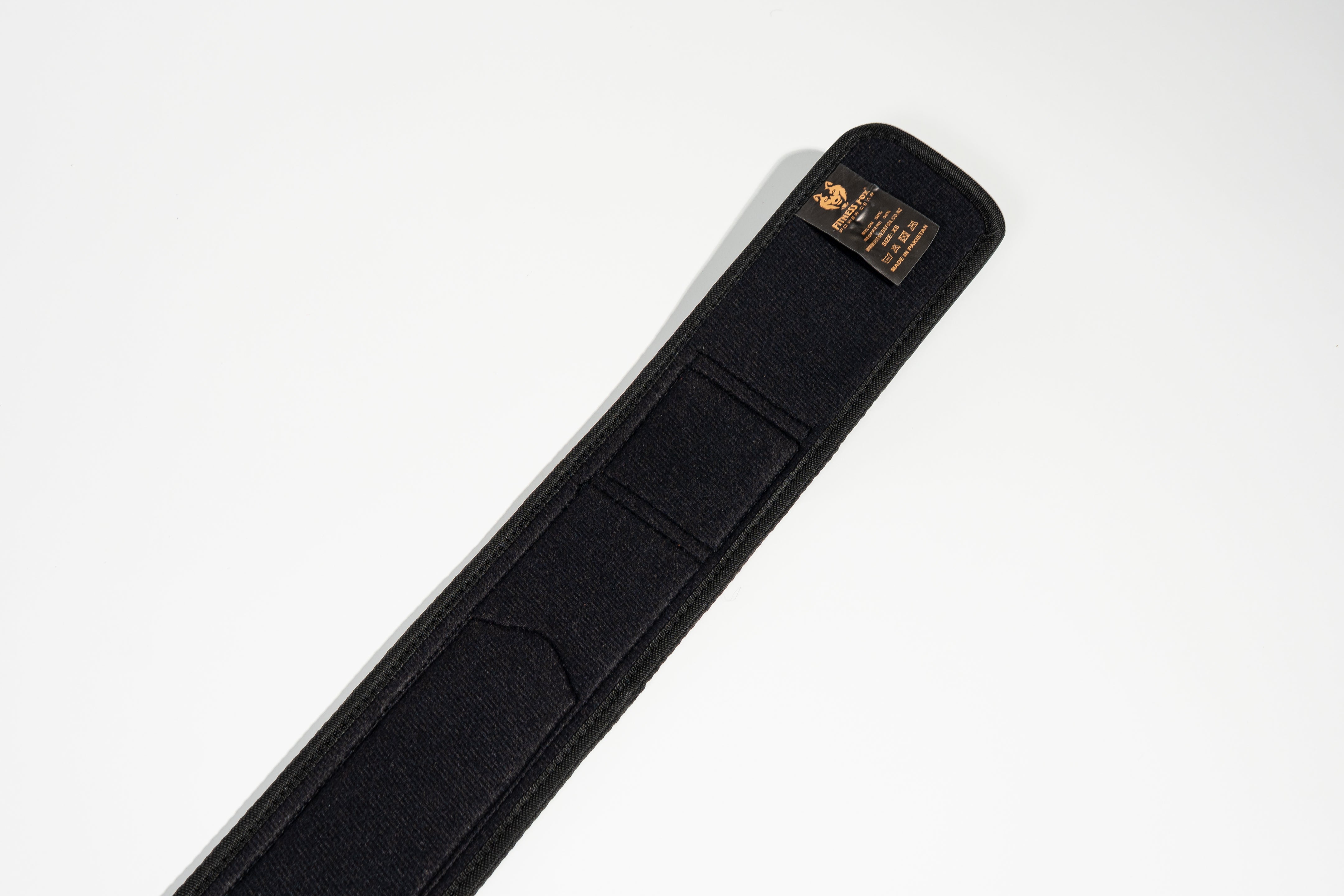 Flat lay — Fitness Fox quick-locking belt, sizes XS–4XL available (2XL sold out)