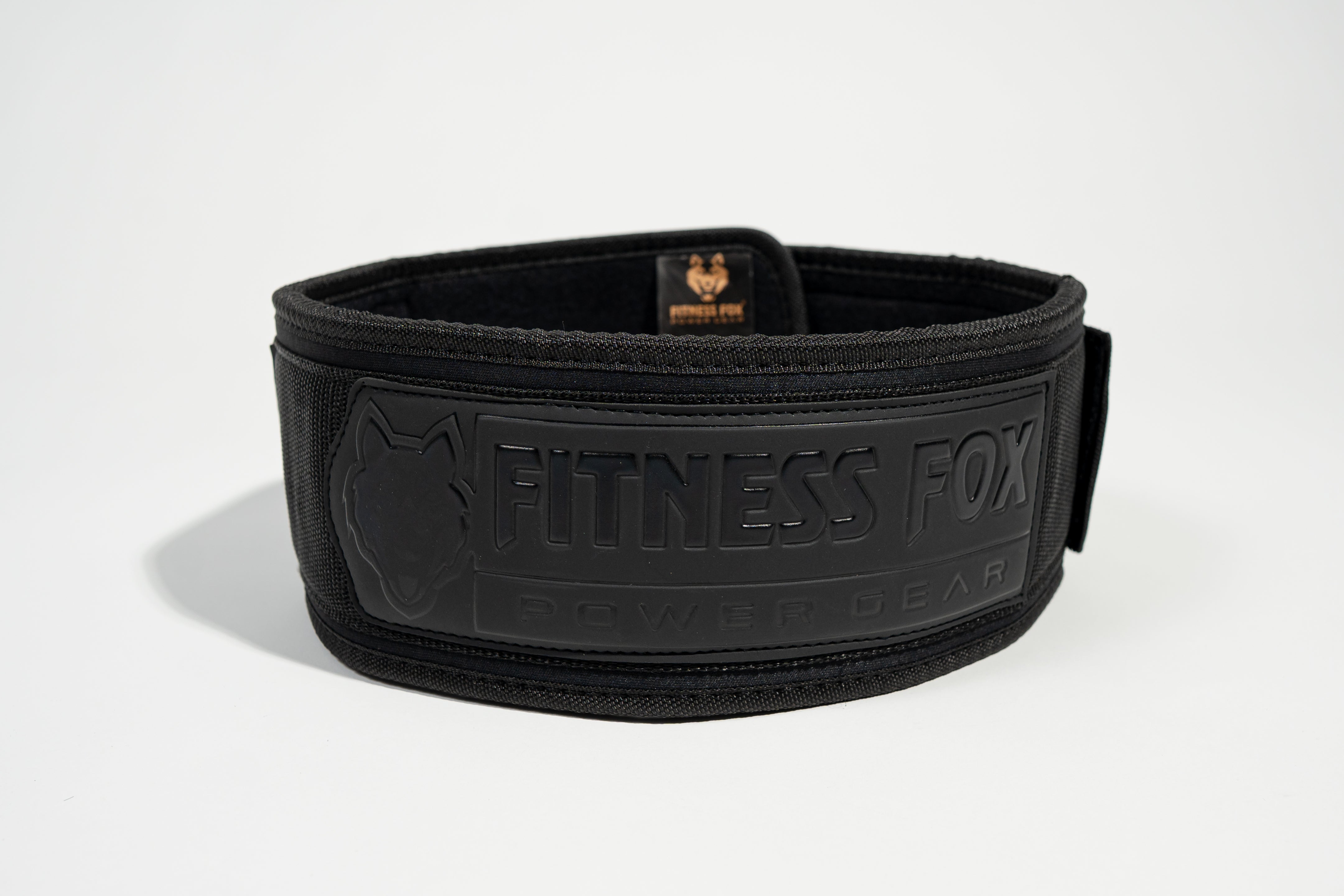 Rolled/packed — Blackout edition belt rolled for gym bag portability
