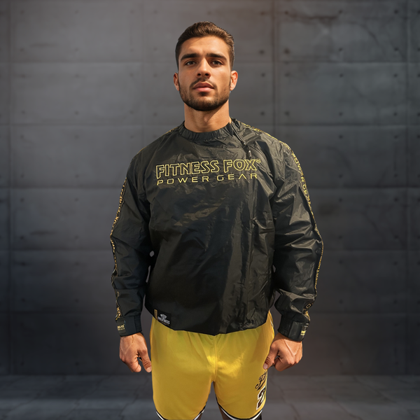 Front view of the black crewneck Fitness Fox sauna jacket with gold strip, highlighting rubberised lining and an oversized athletic fit for heat-focused training sessions.