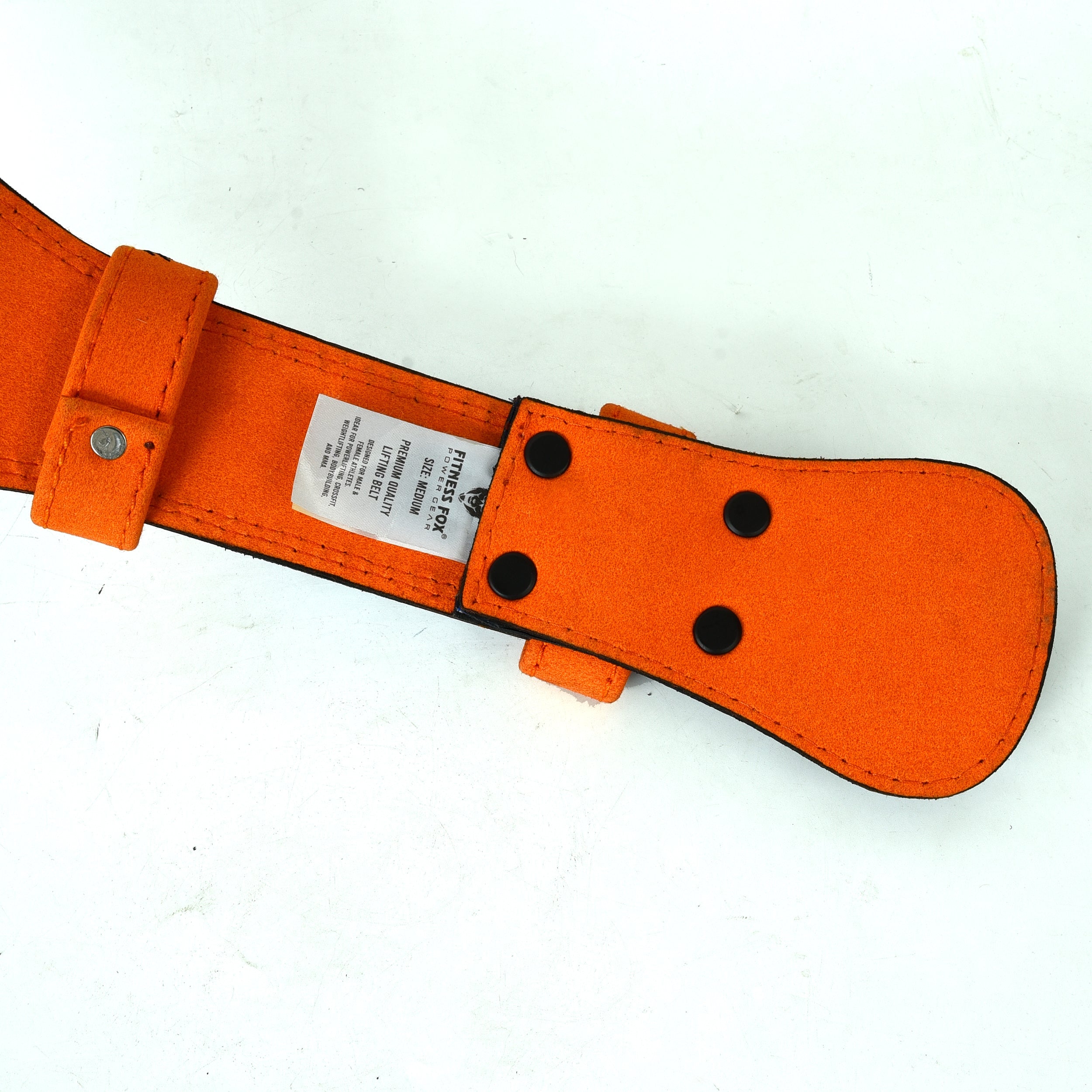 close-up of black steel double-roller prong and double-stitched edges on the blue belt