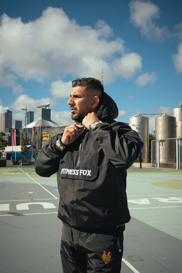 Close-up detail of coated polyester-nylon shell and rubberised interior lining, emphasizing sweat retention, durability, and lightweight comfort during short, hydrated training blocks.