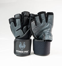 “Close-up detail of reinforced stitching and leather palm texture on Fitness Fox heavy-duty workout gloves designed for durability during strength training.”