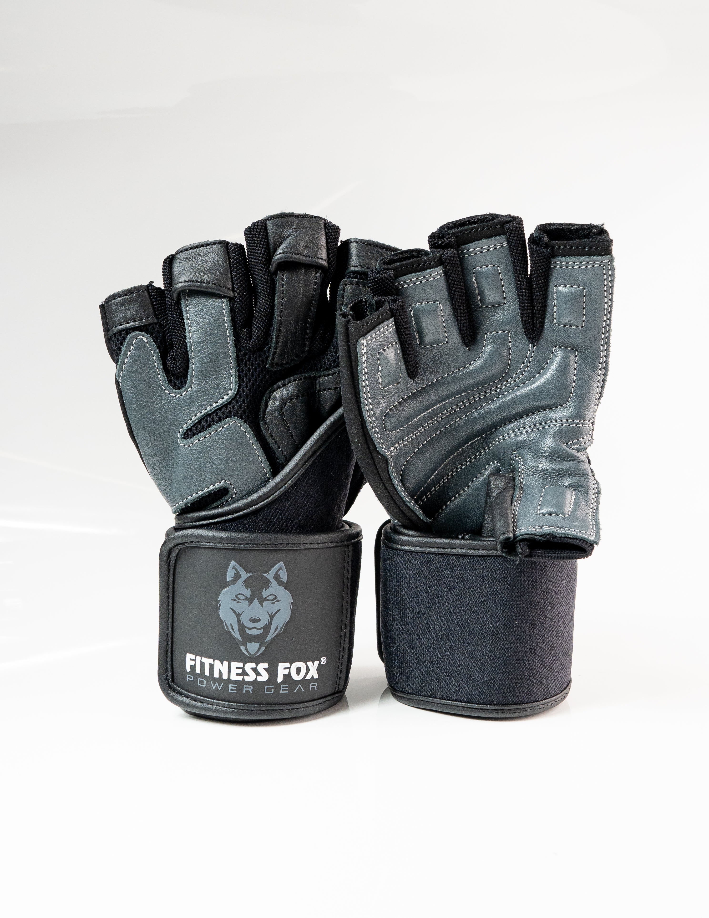“Close-up detail of reinforced stitching and leather palm texture on Fitness Fox heavy-duty workout gloves designed for durability during strength training.”
