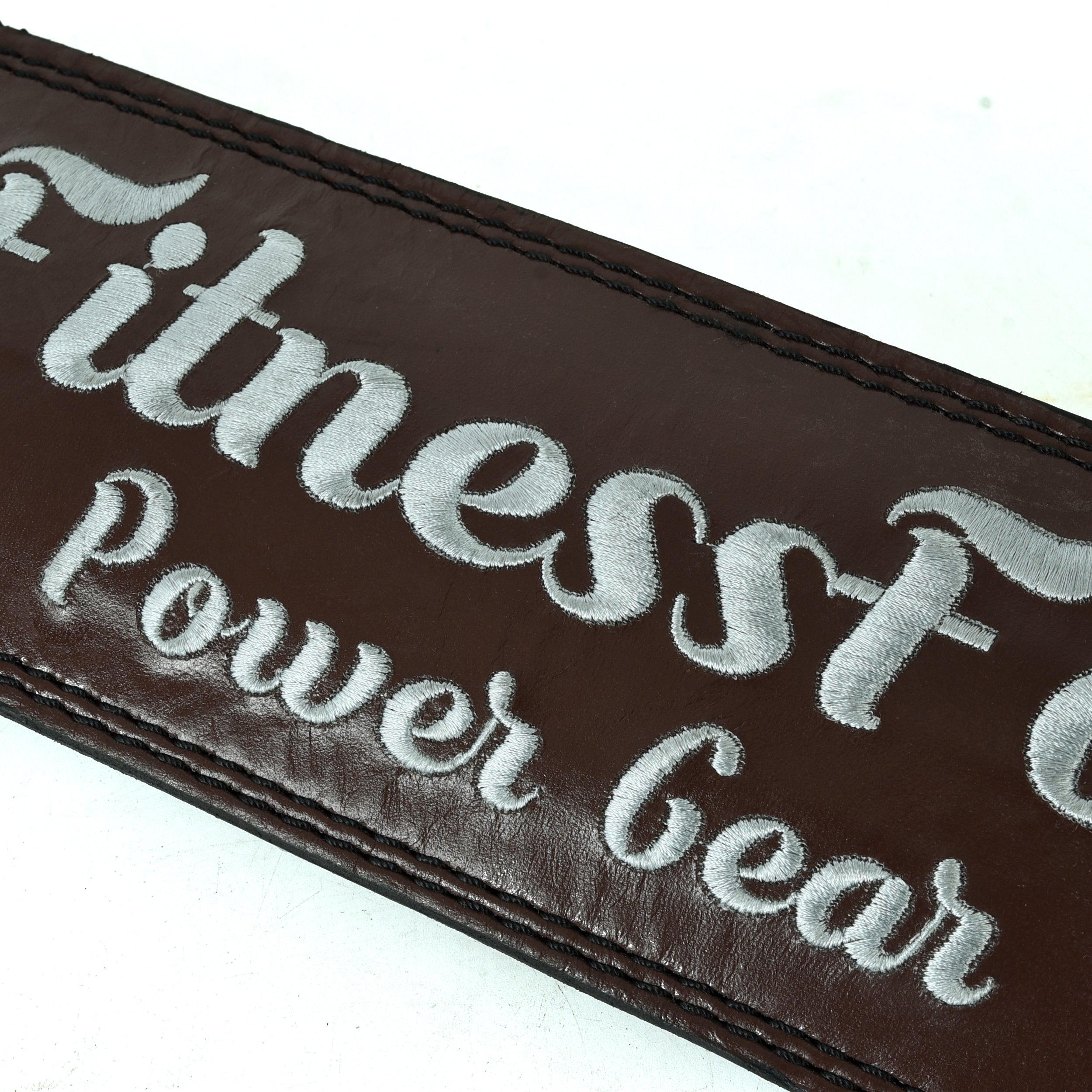 4-inch maroon lifting belt by Fitness Fox showing thickness and firm core support